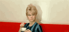bardot stirring coffee