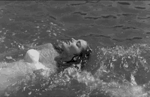 floating kay lawrence creature from the black lagoon swimming take a dip