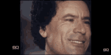 gaddafi libya smile