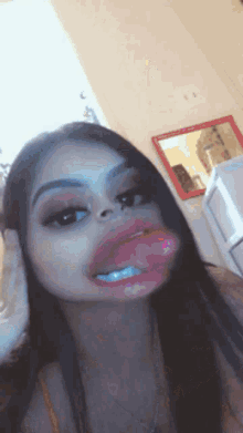 moniquee moni tongue out selfie