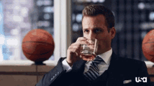 Drinking Harvey GIF - Drinking Harvey Specter GIFs