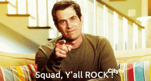 Phil Dunphy on Modern Family pointing then giving thumbs up, saying "Squad, Y'all Rock!" 