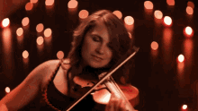 playing violin taylor davis leaves from the vine musician violinist