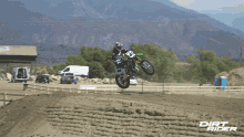 stunt dirt rider full speed in the air ramp