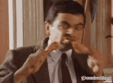 Mr Bean Eating Fried Chicken GIF - Mr Bean Eating Fried Chicken GIFs