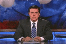 Unamused GIF - Stephen Colbert Balloons Confetti GIFs