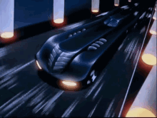 batmobile batman animated series driving fast driving
