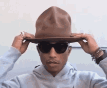 Pharrell Williams Hat GIF - Pharrell Williams Hat Tada GIFs