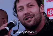 kenny omega wrestler omega chants mic
