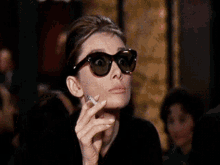 Audrey Hepburn Cigar GIF - Audrey Hepburn Cigar What GIFs