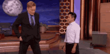 Always Ready GIF - Conan O Brien Ripping Off Clothes GIFs