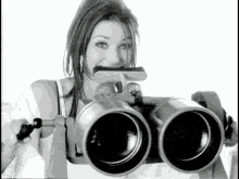 Hiding At A Giant Binoculars Shania Twain GIF - Hiding At A Giant Binoculars Shania Twain When You Kiss Me GIFs