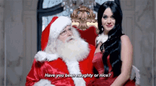Naughty Or Nice Mrs Claus GIF - Naughty Or Nice Mrs Claus Katy Perry GIFs
