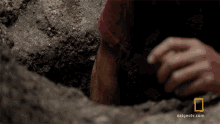 deep hole subterranean treasure primal survivor getting water filling up bottle