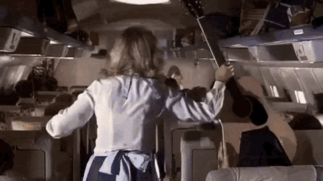 airplane,guitar,ouch,Hit Head,80s Movies,oops,sorry,headache,gif,animated g...
