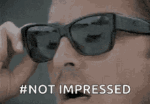 Not Impressed Too Many Sunglasses GIF - Not Impressed Too Many Sunglasses Sunglasses Dude GIFs