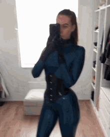 Latex Catsuit GIF - Latex Catsuit Selfie GIFs