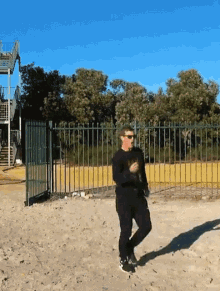 Walking Walk In The Park GIF - Walking Walk In The Park Pure Black Outfit GIFs