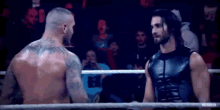 Orton Rollins GIF - Orton Rollins Fist Bump GIFs