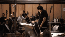 conductor music director musicians orchestra focused conductor music director musicians orchestra focused
