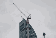Crane On Skyscraper GIF - Crane Construction Construction Crane GIFs