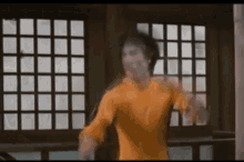Bruce Lee Nunchaku GIF - Bruce Lee Nunchaku Fight GIFs