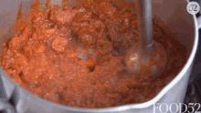 blending food52 tomato sauce hand blender mixing