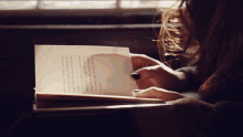 Reading Book GIF - Reading Book Turn The Pages GIFs