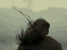 hair blowing woman wind