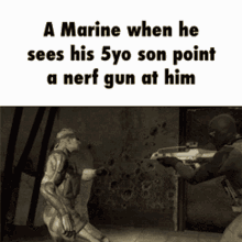 A Marine When He Sees His5yo Son Pointing A Nerf Gun At Him Im Not Backing Down GIF - A Marine When He Sees His5yo Son Pointing A Nerf Gun At Him Im Not Backing Down GIFs