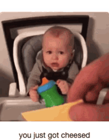 Baby Prank Throwing Cheese GIF - Baby Prank Throwing Cheese You Just Got Cheesed GIFs