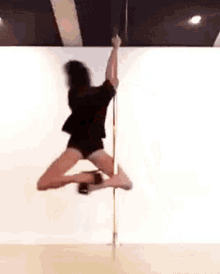 Pole Dance Phoebe Tonkin GIF - Pole Dance Phoebe Tonkin Hair Flip GIFs