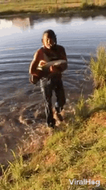 big fish viralhog man dives on fish that snaps line catch river