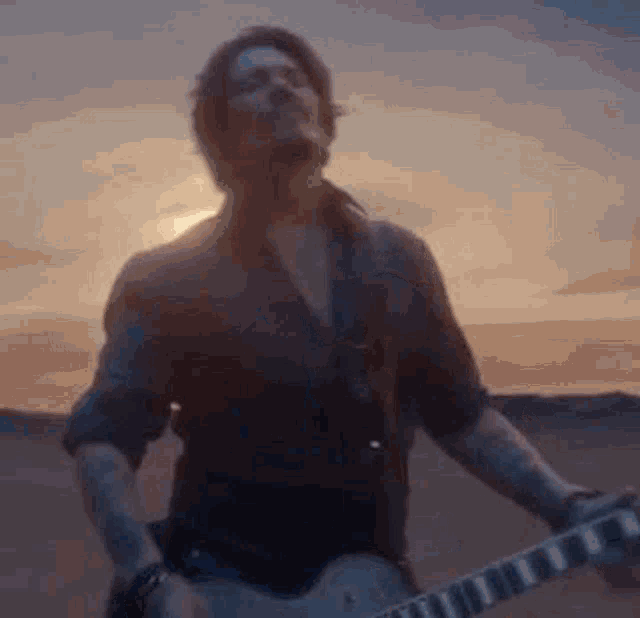 Johnny Depp Sauvage GIF - Johnny Depp Sauvage Guitar GIFs