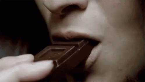 Eating Chocolate GIF - Chocolate Yum Munching GIFs