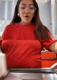 Cashier At The Counter GIF - Cashier At The Counter Checking Items GIFs