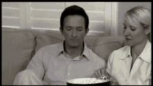 Popcorn Fail GIF - Jeff Probst Tooth Ache Ouch GIFs