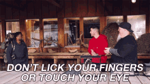 Dont Lick Your Fingers Or Touch Your Eye GIF - Dont Lick Your Fingers Or Touch Your Eye Dont Touch Your Face GIFs