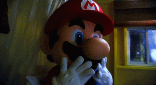 Mario Shocked GIF - Mario Shocked Hands On Mouth - Discover & Share GIFs