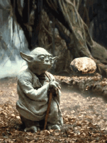 Flying Stone Yoda GIF - Flying Stone Yoda Star Wars GIFs
