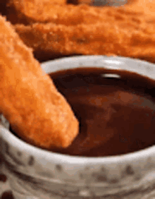 Churros Dipping GIF - Churros Dipping Chocolate Sauce GIFs