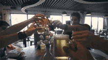 Cat Dealers Cheers GIF - Cat Dealers Cheers Drink Up GIFs