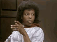 Sly Stone Who Cares GIF - Sly Stone Who Cares Shrug Shoulders GIFs