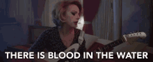 There Is Blood In The Water Weakness GIF - There Is Blood In The Water Weakness Playing Guitar GIFs
