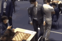 chess awkward handshake fist bump fail