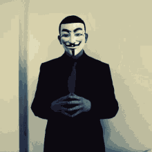 Guy Fawkes Mask Look GIF - Guy Fawkes Mask Mask Look GIFs