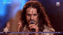 michal szpak long hair makeup man eurovision
