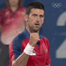 Raised Fist Novak Djokovic GIF - Raised Fist Novak Djokovic Serbia Tennis Team GIFs