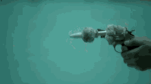 Slow-mo Underwater Bullets - 27450 Fps!! GIF - Slo Mo Slow Mo Sow GIFs