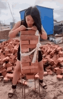 Bricks Strong Girl GIF - Bricks Strong Girl GIFs